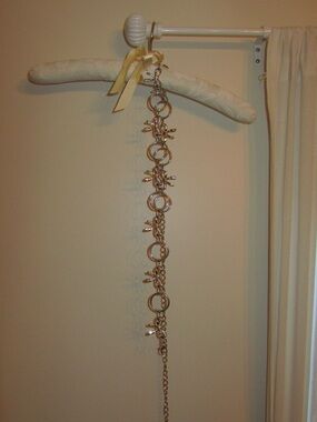Silver-tone Bow and Ring charm Link Belt